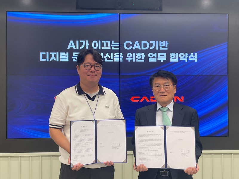 이해석 폴라리스오피스 사업본부장 겸 그룹AI총괄(왼쪽), 박승훈 캐디안 대표이사 (출처 : 캐디안)